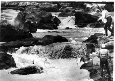 Noland Throwing a Rope to Hunter in Cossatot Falls.jpg